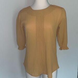 Mustard yellow blouse